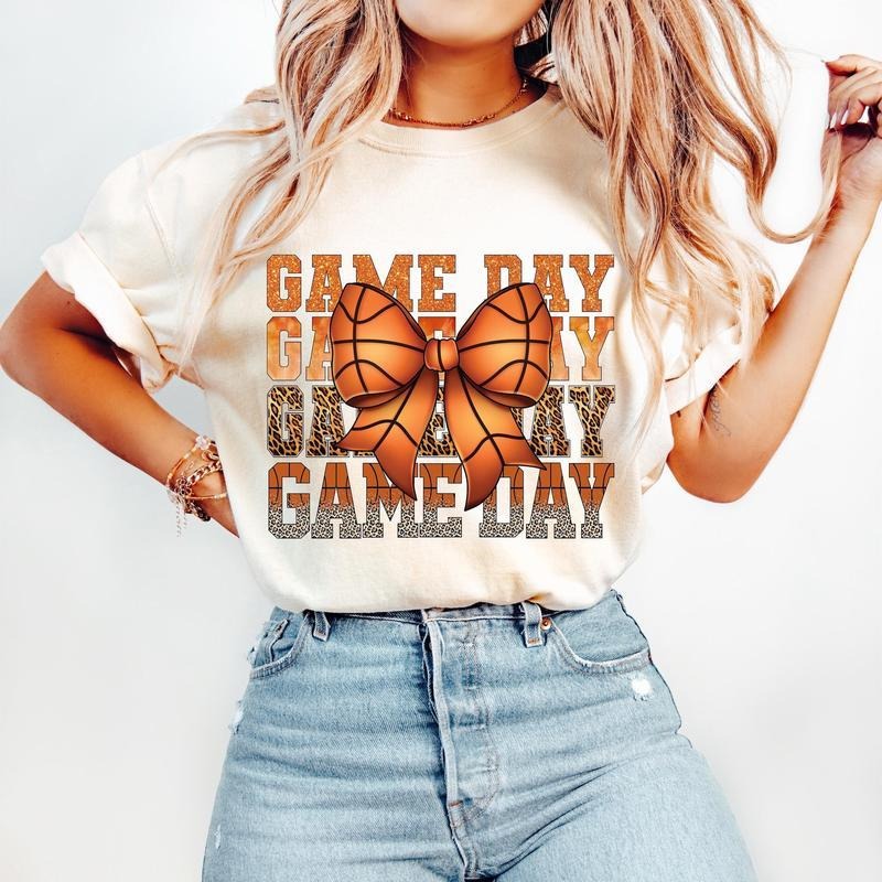Coquette Basketball T-Shirt, Game Day Basketball T-Shirt, Basketball Mama Bow T-Shirt, Leopard Print, Basketball Mom T-Shirt, Retro Basketball, tshirt hot trend 2025