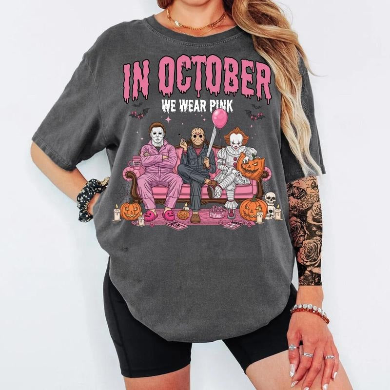 In October We Wear Pink Halloween Shirt | Funny Horror Movie Characters Tee | Spooky Season Graphic T-Shirt for Women