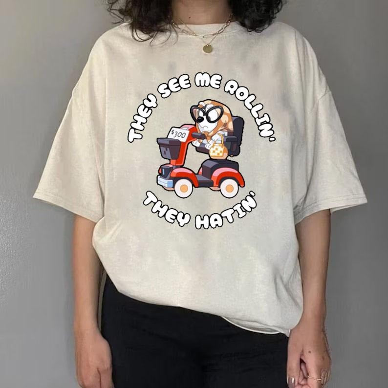Muffin Heeler Shirt, Bluey Tee Shirt , Bluey Character, Funny Mom Tee Shirt, They See Me Rollin They Hatin Muffin Heeler Tshirt | Grannie Mobile | Bluey The Grannies | Here Come The Grannies | Muffin Riding a Scooter