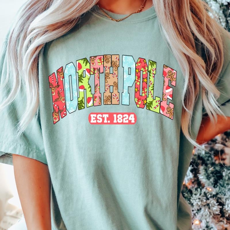 North Pole EST. 1824 Christmas shirt, Comfort Colors T-shirt, Oversized Christmas T-shirt, Graphic Christmas tshirt, Christmas Gift for Women, Lady Tshirt