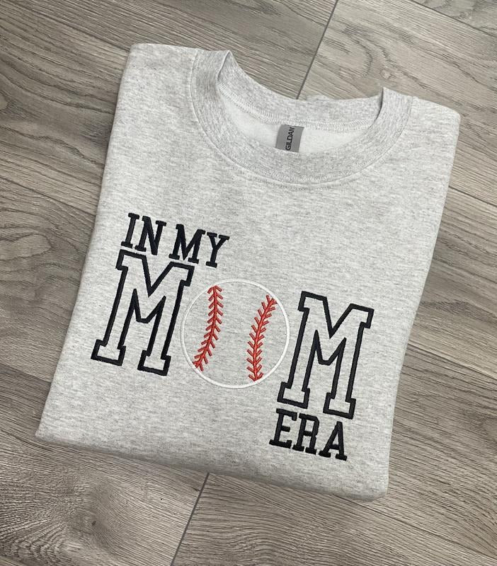 Gildan Baseball Mom Era Crewneck Sweatshirt, Classic Fit, Heather Sport Colors, Comfortable Cotton/Polyester Blend, Women's Tops and Sweaters