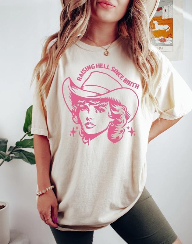 Raising Hell Since Birth Shirt, Country Concert Shirt, Western Graphic Tee, Country Shirts, Cowgirl Shirt, Trendy Western Shirt, Rodeo Shirt Menswear Top Underwear Tshirt Streetwear Man Tropical Crewneck Shortsleeve Round Neck Casual