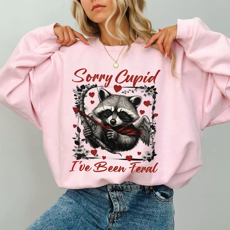 Sorry Cupid I've Been Feral Funny Graphic Sweatshirt, Coquette Valentine Heart Pullover, Sarcastic Gifts, Feral Raccoon Crewneck Sweater.