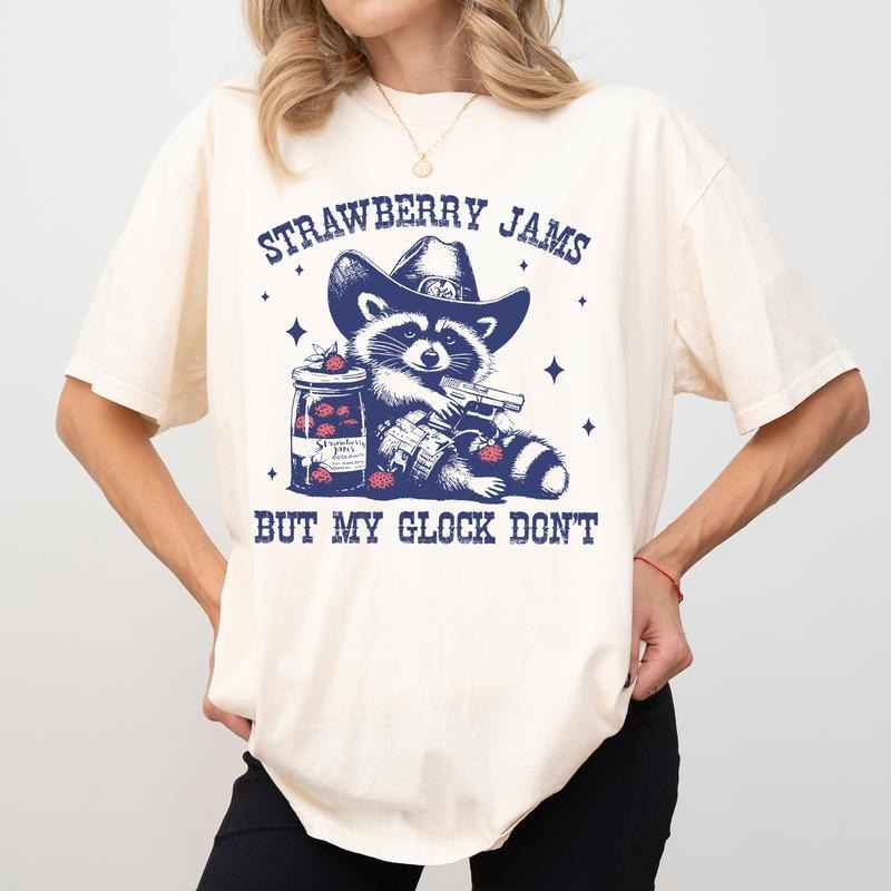 Strawberry Jams But My Glock Don't Comfort Colors Shirt, Western Cowboy Raccoon T-shirt, Funny Meme Graphic Tee, Raccoon Lovers Clothing, Womenswear