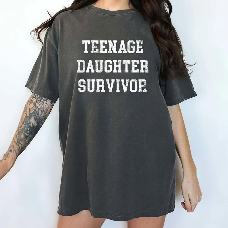 Teenage Daughter Survivor Shirt, Funny Graphic Printed Tee For Dad, Daughter's Mother Unhinged Shirt, Funny Parents Tee, Motherhood Fatherhood Comfy Fabric Graphic Tee, Menswear, Women's Tops, Womenswear, Cotton Soft Fabric Tee