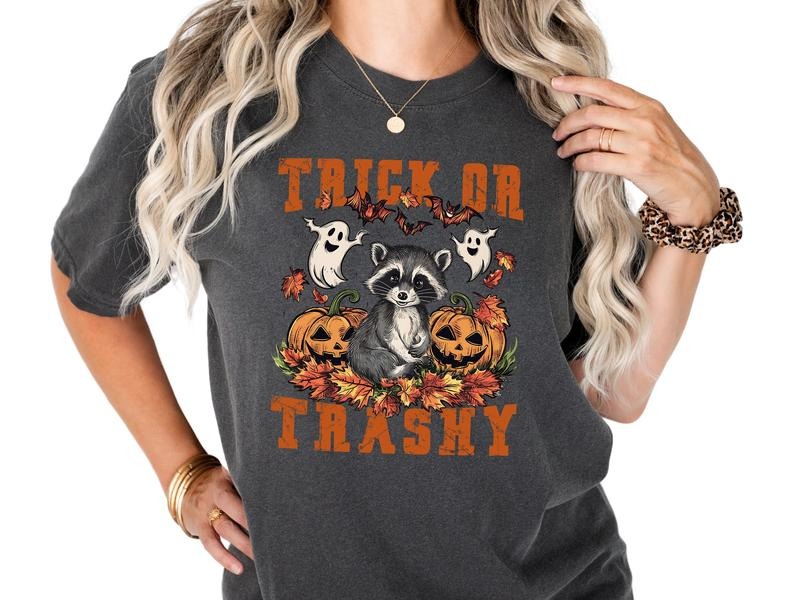 Trick or Trashy Raccoon Fall & Halloween T Shirt, Unisex Sizing Halloween Graphic Tee,  Short Sleeve Crewneck Casual Halloween Shirt for Women, Womenswear, Trash Panda Trendy Top