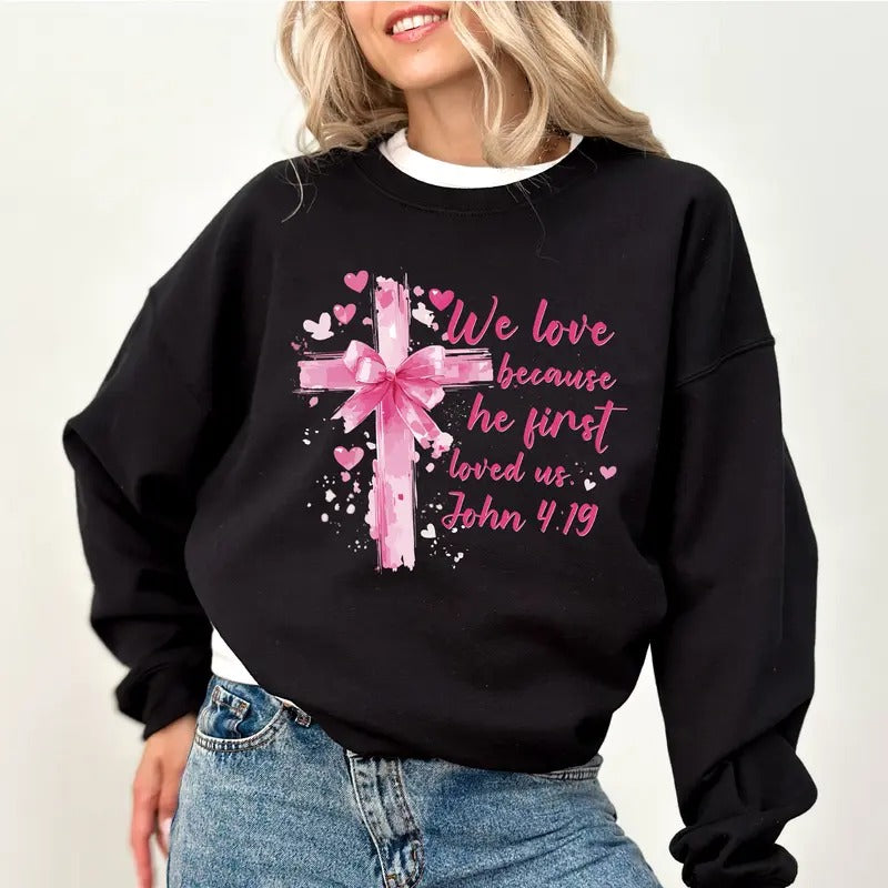 Vintage We Love Because He Loved Us First Sweatshirt, Coquette Cross Bow Sweater, Valentine's Day Shirt, Christian Clothing Gift, Bible Verse Pullover