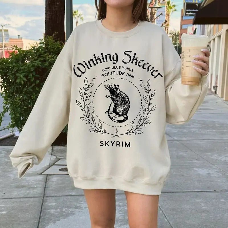 Winking Skeever SKYRIM Sweatshirt, Skyrim Merch, Solitude Skyrim Hoodie, Gamer Merch, Skyrim Gift, Video Game Shirt, Elder Scrolls Unisex Soft Crewneck Pullover Long Sleeves Graphic Fabric Sweater